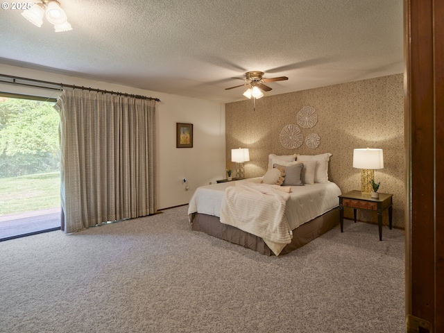 135 Ridgecrest Dr, Toledo, WA 98591 - carpeted bedroom with a textured ceiling, access to outside, and ceiling fan
