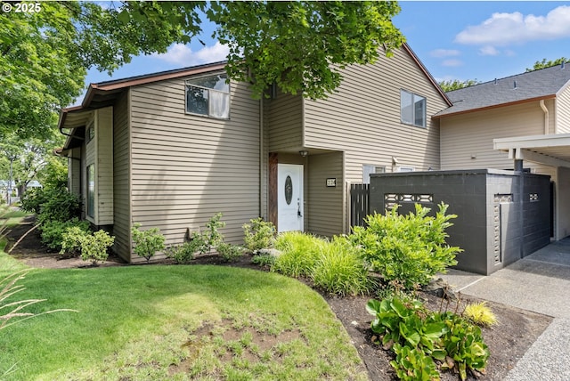224 N Hayden Bay Dr, Portland, OR 97217 - view of front facade featuring a front yard and concrete driveway