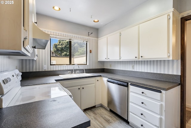 224 N Hayden Bay Dr, Portland, OR 97217 - kitchen featuring dishwasher, light wood-type flooring, range hood, white range with electric cooktop, and dark countertops