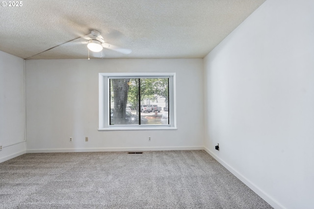 224 N Hayden Bay Dr, Portland, OR 97217 - empty room with a textured ceiling, carpet flooring, and ceiling fan