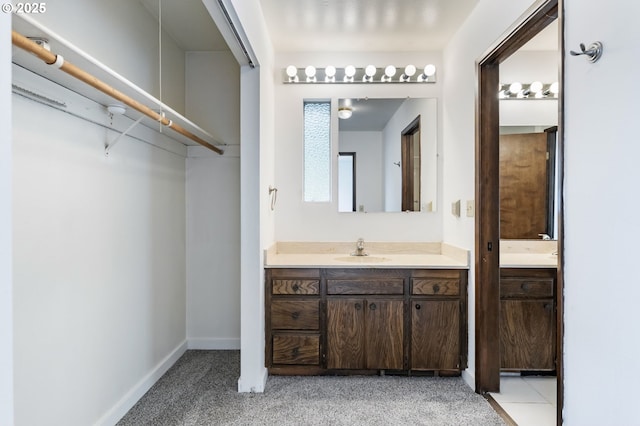 224 N Hayden Bay Dr, Portland, OR 97217 - bathroom featuring vanity and baseboards
