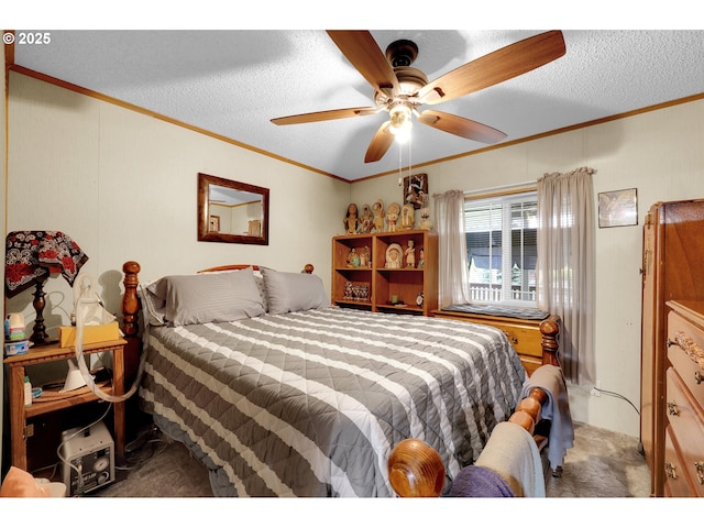 bedroom featuring ornamental molding, a ceiling fan, carpet flooring, and a textured ceiling