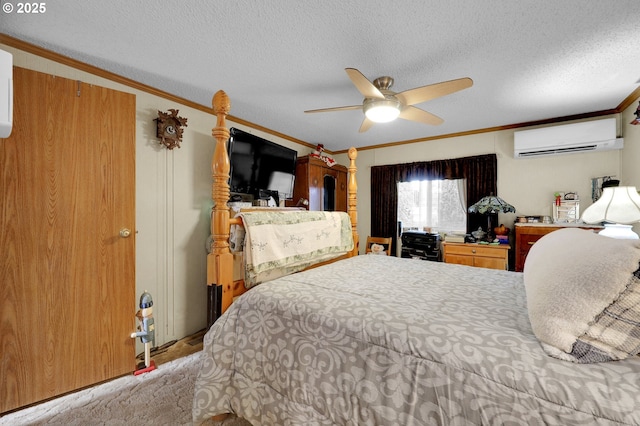 39028 Dexter Rd, Dexter, OR 97431 - bedroom featuring a ceiling fan, a textured ceiling, a wall unit AC, and ornamental molding