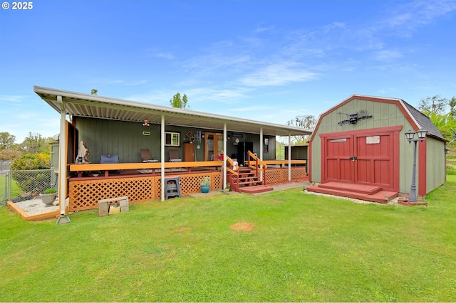 39028 Dexter Rd, Dexter, OR 97431 - back of house with an outdoor structure, fence, a wooden deck, a lawn, and a storage shed