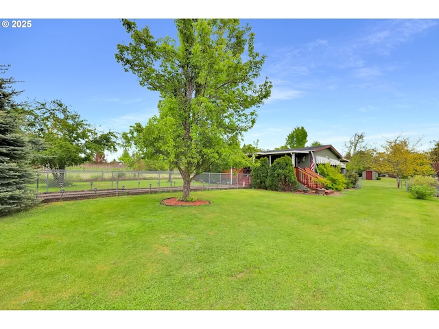 view of yard with fence