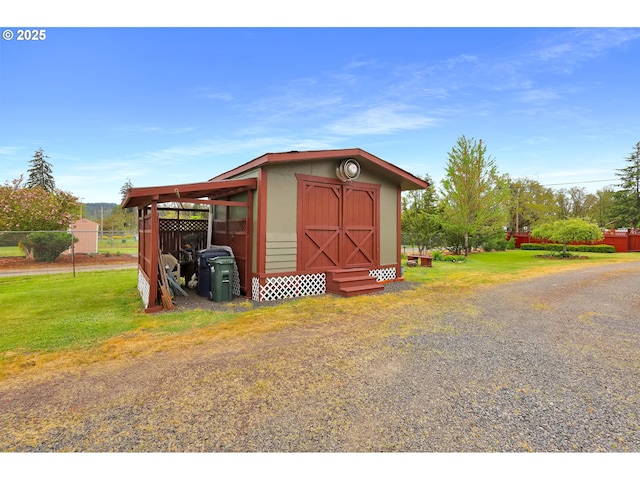 view of shed with fence