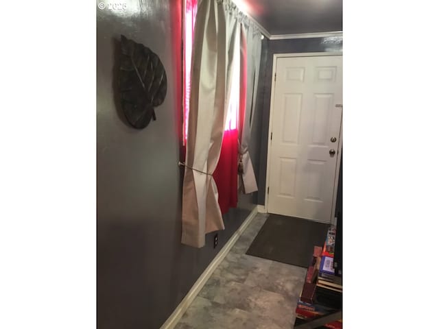 interior space with baseboards