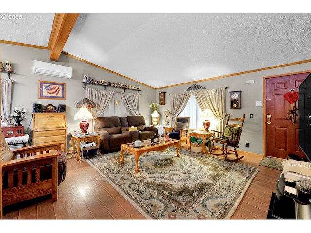 living room with vaulted ceiling with beams, ornamental molding, a wall unit AC, and wood finished floors
