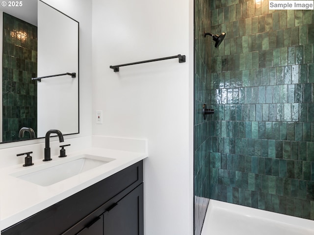 7195 SE Crystal Springs Blvd Unit 7, Portland, OR 97206 - bathroom featuring vanity and a tile shower