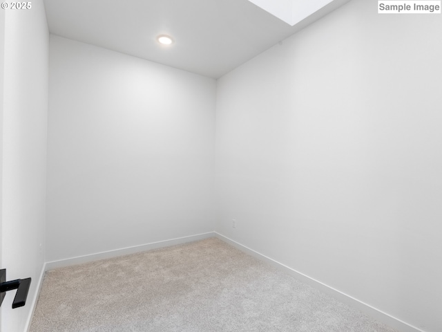 7195 SE Crystal Springs Blvd Unit 7, Portland, OR 97206 - carpeted empty room featuring a skylight and recessed lighting