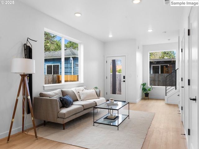 7195 SE Crystal Springs Blvd Unit 7, Portland, OR 97206 - living area with light wood-style flooring, healthy amount of natural light, recessed lighting, and stairs
