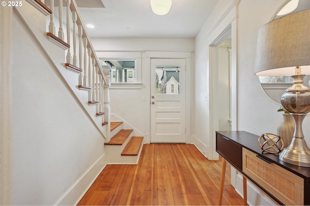 4131 NE Cleveland Ave, Portland, OR 97211 - entrance foyer with light wood-style flooring and stairway