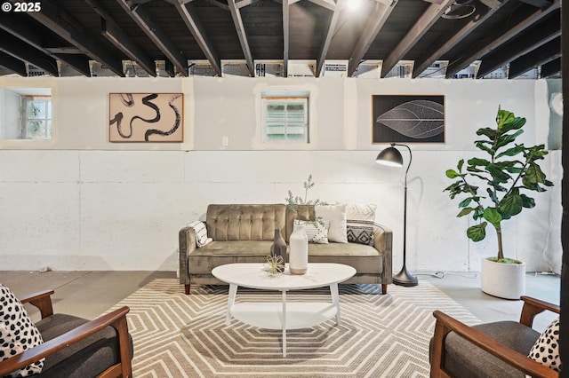 4131 NE Cleveland Ave, Portland, OR 97211 - living room featuring concrete floors and beam ceiling