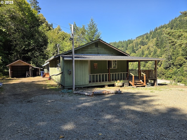 33080 Lupine Way Rd, Gold Beach, OR 97444 - view of front of property featuring a wooded view