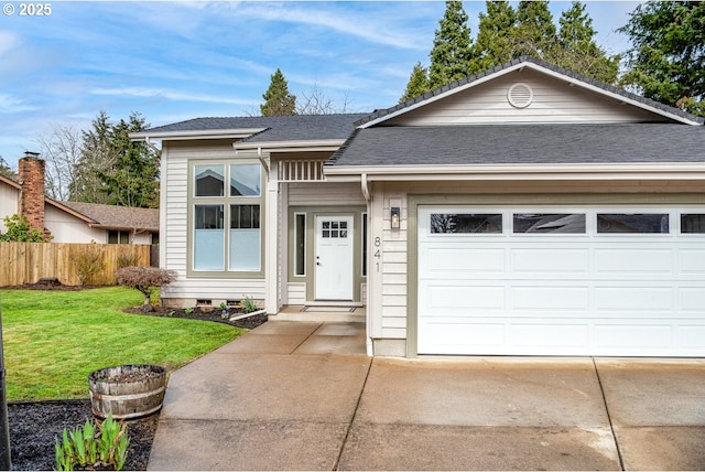 view of front of property with a front lawn, fence, concrete driveway, roof with shingles, and an attached garage