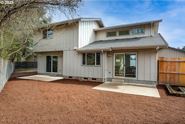 back of property featuring crawl space, a patio, a fenced backyard, and a shingled roof