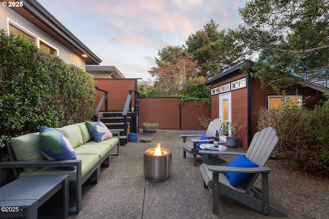3109 NW Neptune Ave, Lincoln City, OR 97367 - view of patio featuring an outdoor living space with a fire pit and an outdoor structure