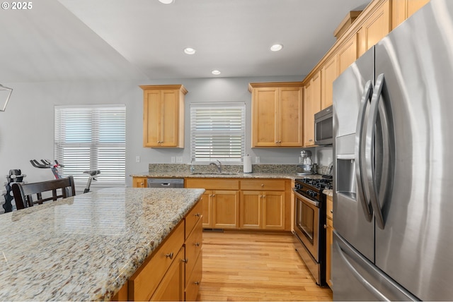 521 Wildcat Canyon Rd, Sutherlin, OR 97479 - kitchen with stainless steel appliances, light wood-style floors, plenty of natural light, light stone countertops, and recessed lighting