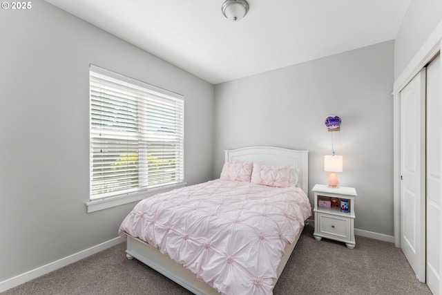 521 Wildcat Canyon Rd, Sutherlin, OR 97479 - carpeted bedroom featuring a closet, multiple windows, and baseboards