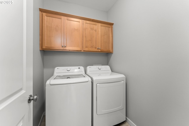 521 Wildcat Canyon Rd, Sutherlin, OR 97479 - laundry room featuring washer and dryer, cabinet space, and baseboards