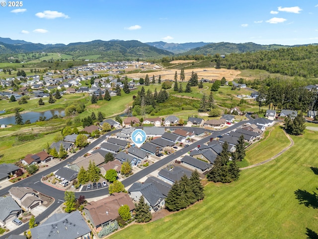 521 Wildcat Canyon Rd, Sutherlin, OR 97479 - aerial perspective of suburban area featuring a water and mountain view