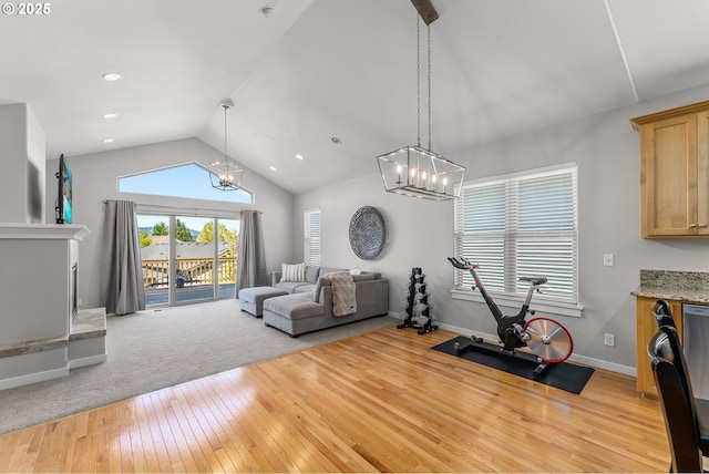 521 Wildcat Canyon Rd, Sutherlin, OR 97479 - living room featuring light wood-style floors, lofted ceiling, a chandelier, baseboards, and recessed lighting