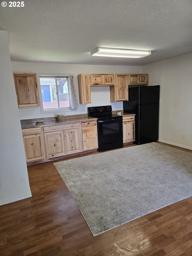 1625 Jackson St, Albany, OR 97322 - kitchen featuring black appliances, light brown cabinets, dark wood-type flooring, and a textured ceiling