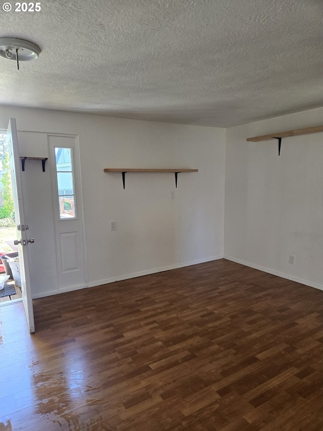 1625 Jackson St, Albany, OR 97322 - entryway with dark wood-type flooring and a textured ceiling