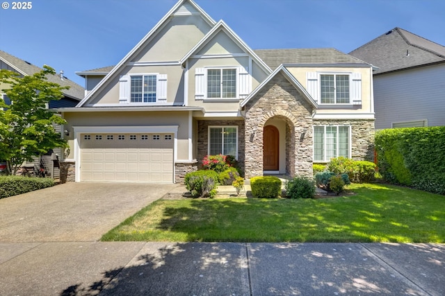 13605 NW Hogan St, Portland, OR 97229 - view of front facade with stone siding, stucco siding, concrete driveway, and an attached garage