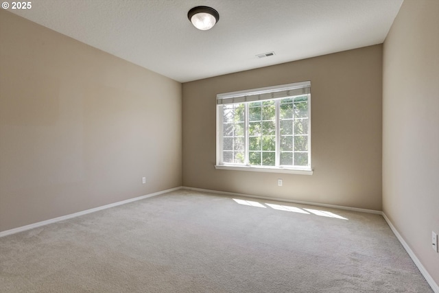 13605 NW Hogan St, Portland, OR 97229 - empty room with carpet flooring and baseboards