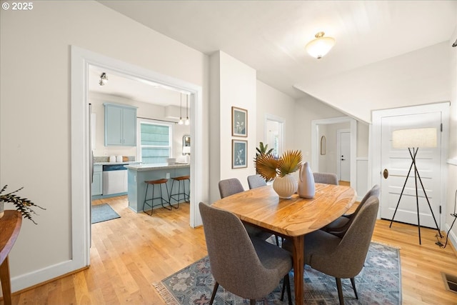 dining room featuring light wood-type flooring