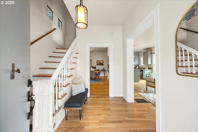 entrance foyer with light hardwood / wood-style flooring