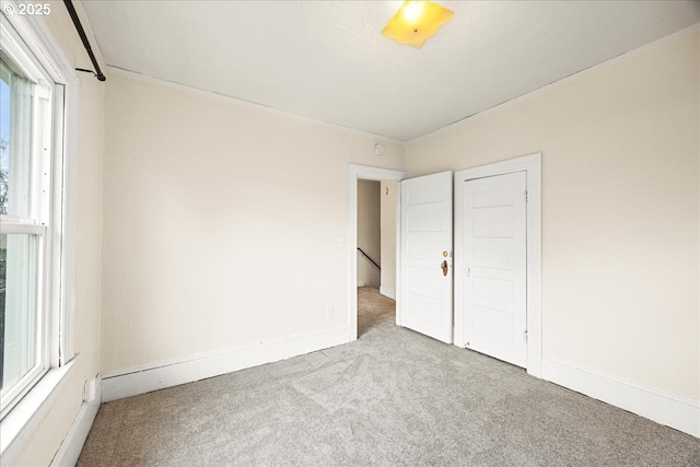 unfurnished bedroom with carpet flooring