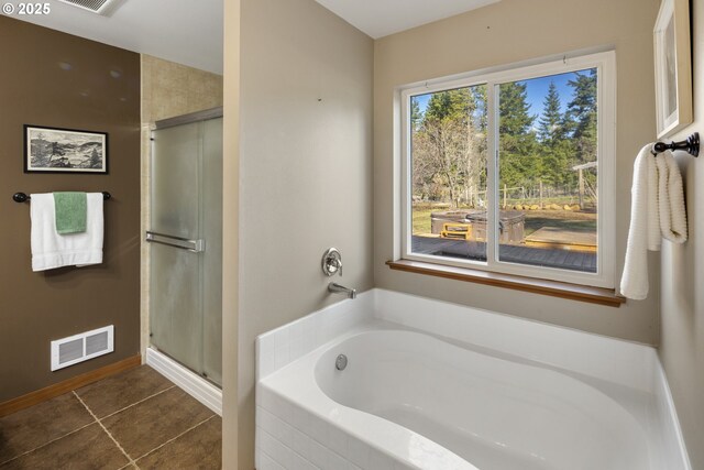 20 Silva Cutoff Rd, Lyle, WA 98635 - bathroom with tile patterned floors, a stall shower, visible vents, baseboards, and a garden tub