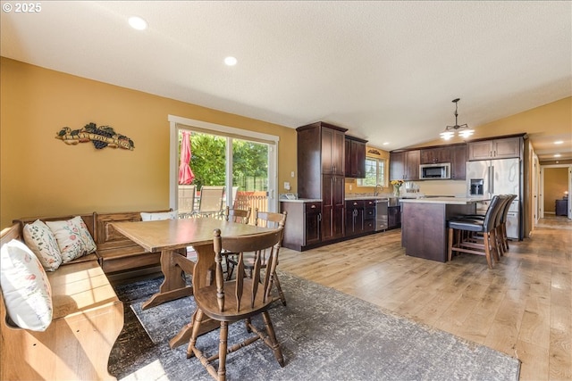 18203 S Windy City Rd, Mulino, OR 97042 - dining space with light wood-style flooring, vaulted ceiling, and recessed lighting