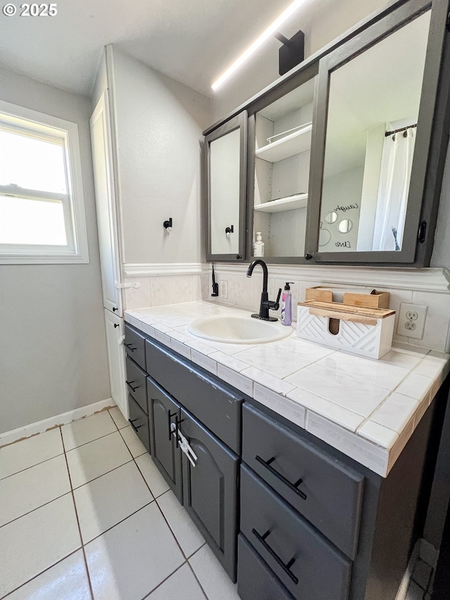 858 E Main St, John Day, OR 97845 - bathroom with vanity and tile patterned floors