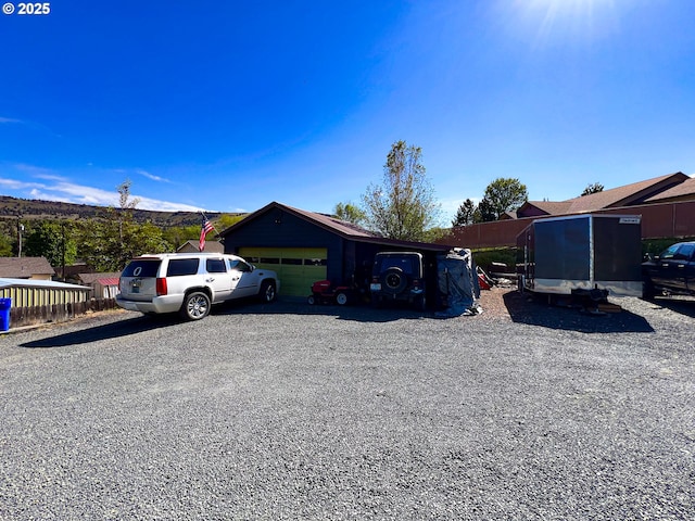 858 E Main St, John Day, OR 97845 - view of front of home featuring a garage and driveway