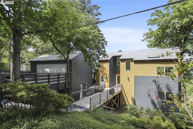 175 SW 85th Ave, Portland, OR 97225 - rear view of property featuring a metal roof and a standing seam roof