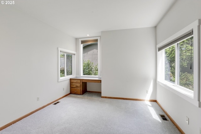 175 SW 85th Ave, Portland, OR 97225 - unfurnished room featuring light colored carpet, a desk, and recessed lighting
