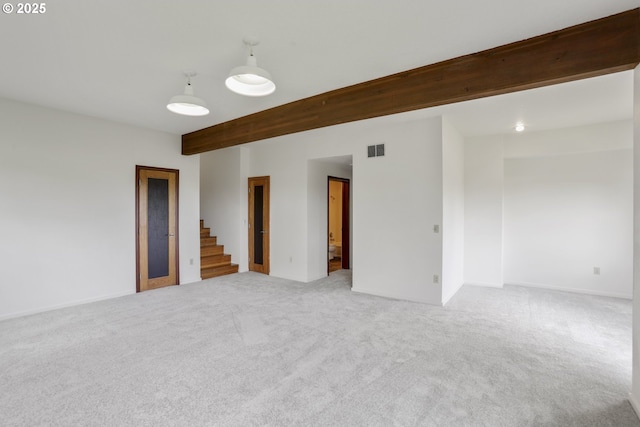 175 SW 85th Ave, Portland, OR 97225 - empty room featuring light colored carpet, beamed ceiling, and stairs