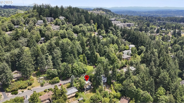 175 SW 85th Ave, Portland, OR 97225 - aerial view of property and surrounding area with a heavily wooded area and mountains