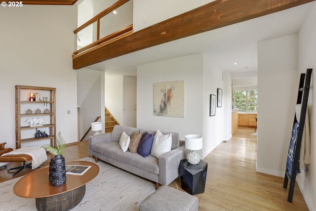 175 SW 85th Ave, Portland, OR 97225 - living room featuring light wood-style flooring, stairs, and recessed lighting