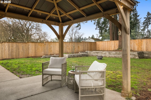 view of patio / terrace featuring a gazebo and a fenced backyard