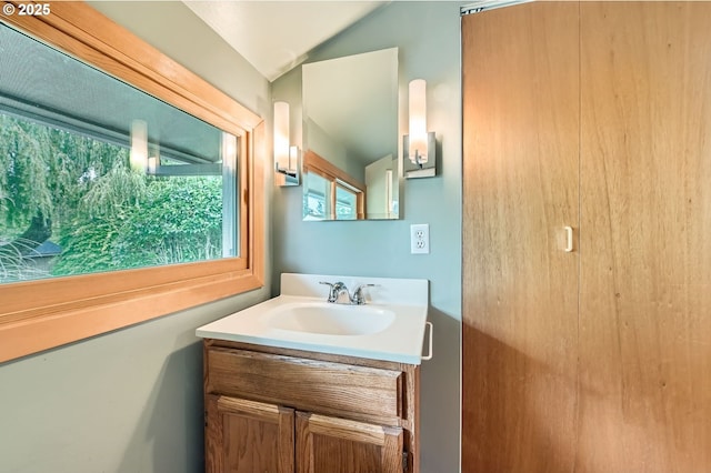 9843 SW 57th Ave, Portland, OR 97219 - bathroom featuring vanity and vaulted ceiling