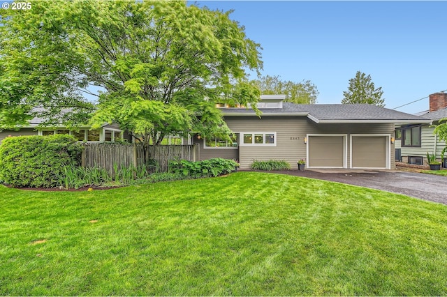 9843 SW 57th Ave, Portland, OR 97219 - view of front of property featuring asphalt driveway and an attached garage