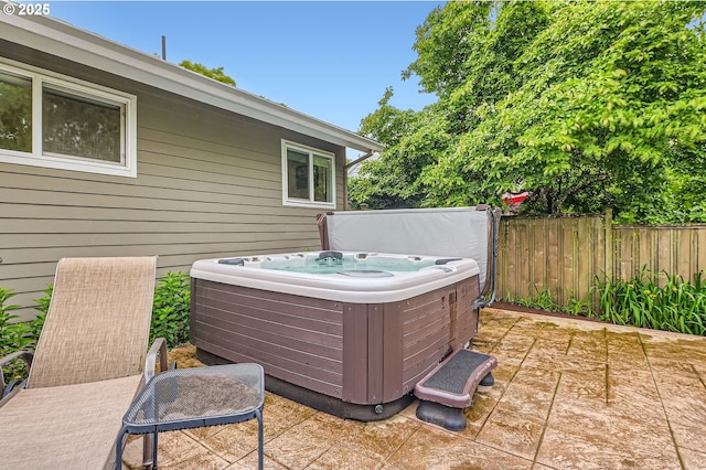 9843 SW 57th Ave, Portland, OR 97219 - view of patio / terrace with a hot tub