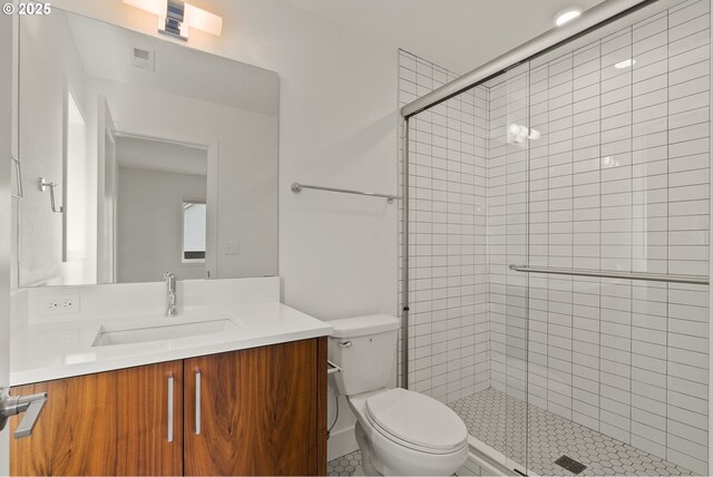 927 SW Maplecrest Ct, Portland, OR 97219 - bathroom with toilet, vanity, and a stall shower