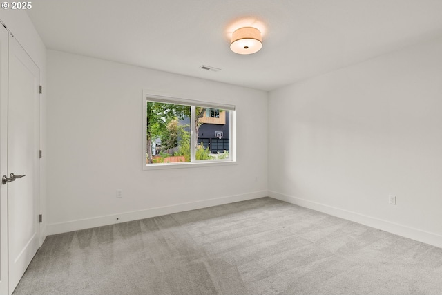 927 SW Maplecrest Ct, Portland, OR 97219 - carpeted empty room with baseboards