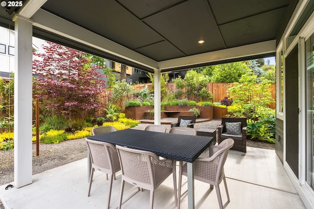 927 SW Maplecrest Ct, Portland, OR 97219 - fenced backyard featuring a patio area, an outdoor living space, and outdoor dining area
