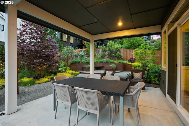 927 SW Maplecrest Ct, Portland, OR 97219 - fenced backyard featuring a patio and outdoor dining area